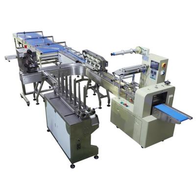 China Large Automatic Food Bread Cake Packing Machine Log Wafer Cookies Flow Pillow Packing Line With Tray for sale