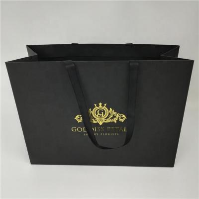 China Recyclable High Quality Kraft Paper Bags , Custom Gold Foil Logo Black Paper Bags for sale