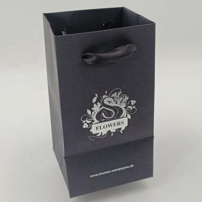 China Recyclable Wholesale Custom Printed Gift Luxury Shopping Paper Bag With Handle for sale