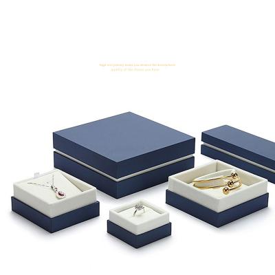 China Handmade Dark Blue Leatherette Jewelry Set Paper Box With Ivory Velvet Lining For Ring Necklace Earring for sale