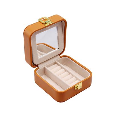 China Handmade Small Pocket Jewelry Box For Rings Earrings Cufflinks Leather Portable Jewelry Storage Case for sale