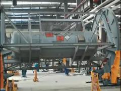 Tank container rotator