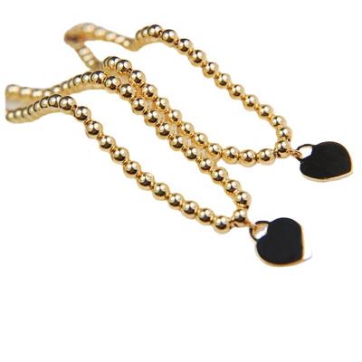 China Xinfly TRENDY Pure 18K Gold Bracelet AU750 Beads Heart Pendant Bracelet Real Gold Beads Jewelry Set Customized for sale