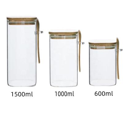 China Freshness Preservation Kitchen High Borosilicate Airtight Clear Glass Storage Jars Set With Spoon Spice Jar for sale