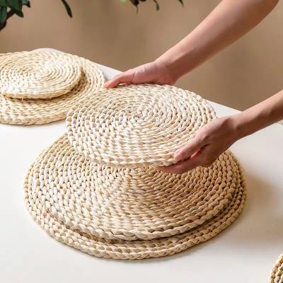 China High Quality Viable Natural Corn Woven Mat For Food Japan Style Corn Place Mat Thickened Heat Insulation Flower Corn Woven Mat for sale