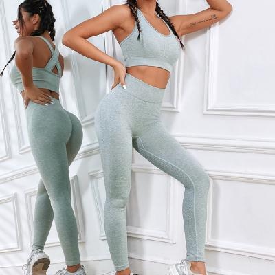 China Breathable High Waisted Workout Yoga Set Women Wear Custom Active Fitness Clothing Tight Leggings Seamless Yoga Set for sale