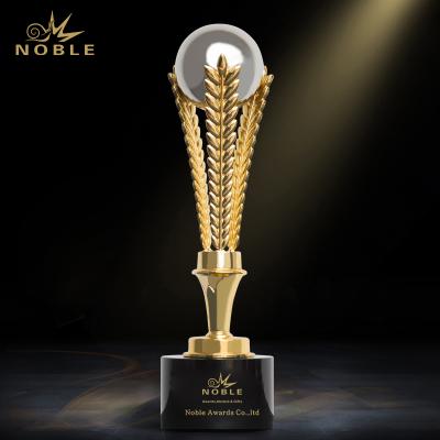 China Europe Noble Awards Custom Made Metal Success Leadership Goble Trophy Awards With Crystal Base for sale