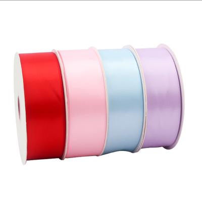 China Viable Wholesale High Quality Colorful Double Face Polyester Satin Ribbon 25mm 25 50 Yards Webbing Rolls Ribbons for sale