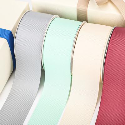 China Viable wholesale high quality 100% polyester fabric 1 2 inch 50 yards pure color ribbon grosgrain hair accessories boutique decorations for sale