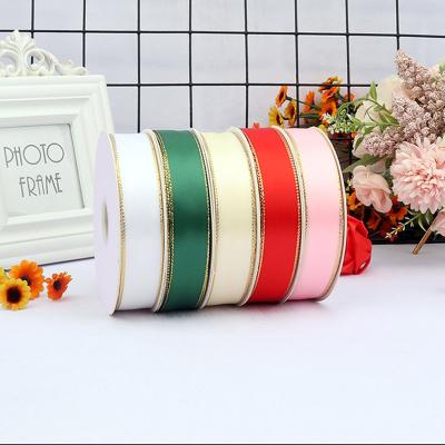 China Polyester Gold Edge Webbing Iridescent Solid Color Ribbon 25mm 38mm Wholesale Ribbons 25 50 100 Yards Roll for sale