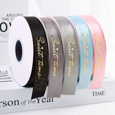 China 100% Customized Hot Stamping Printed Ribbon Iridescent Polyester Gold Foil Webbing Satin Logo Ribbons Wholesale Custom Made for sale