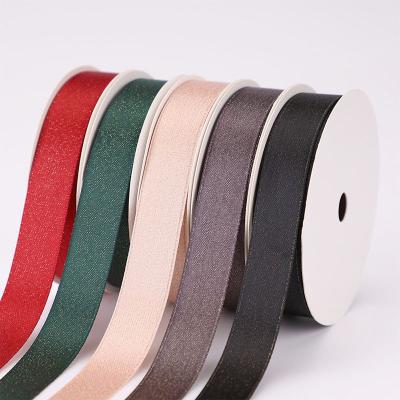 China Viable Wholesale Premium High Quality Metallic 38mm Ribbons 22mm Gold Cloth And Polyester Satin Silver Ribbon Glitter Face Double Face for sale