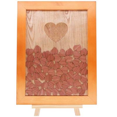 China Guest Book Sign Nature Wood Frame Wedding Guest Book Alternative With 90pcs Drop Wood Hearts Include Wood Stand for sale