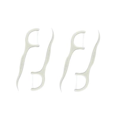 China Manufacturers of high quality eco-friendly health from the brand dental floss rod for sale