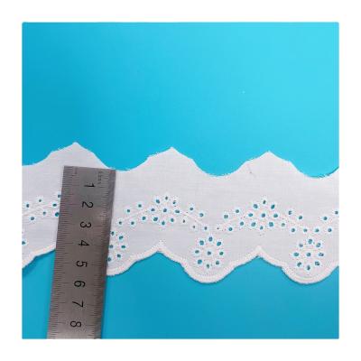 China Full Hole Barcode Shrink-Resistant Polyester Cut Out White Embroidered Lace Fabric for sale