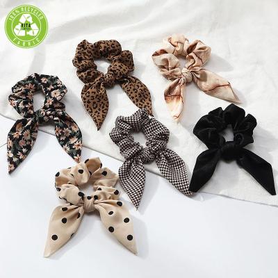 China Custom Animal Print Women Fashion Leopard Hair Bow Tie Sexy Ear Scrunchies for sale