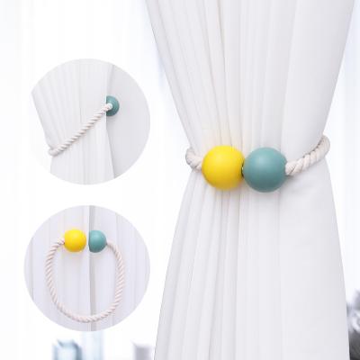 China New Creative Magnetic Color Magnetic Rope Package Ball Curtain Bead Curtain Wooden Buckle Wooden Border Manufacturers Wholesale for sale