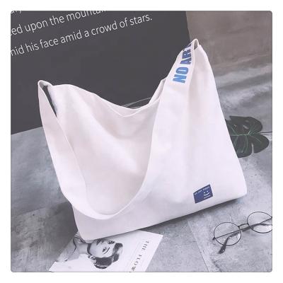 China Multi-Function Korean Style CSIO Solid Color One-Shoulder Shopping English College Retro Canvas Bags Girls for sale