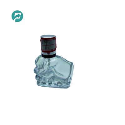 China Personal Care 30ml Fist Shape Perfume Spray Bottle With Aluminum Cap for sale