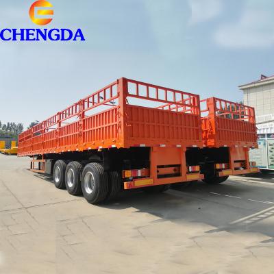 China Truck Trailer 3 Axles 40T 60Tons Drop Wall Cargo Barrier Semi Trailer for sale