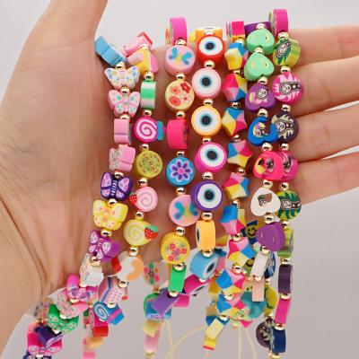 China Colorful Beaded Anti-lost Phone Chain Dvacaman Boho Mobile Chain Pearl Phone Strap Charm Soft Gold Pottery Flower Wrist Phone Chain Handmade for sale