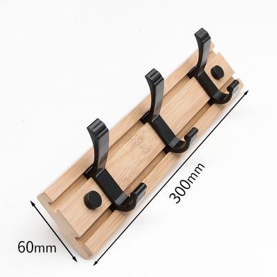 China Simple minimalist Nordic style wall clothes rack movable adjustable household wall hanging hanger for sale