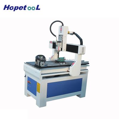 China Building Material Shops 2 Year Warranty 4 Axis 6090 CNC Router for sale