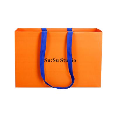 China Recyclable China Supplier Custom Logo Brown Kraft Paper Bags With Handle Custom Logo Paper Bag Rope for sale