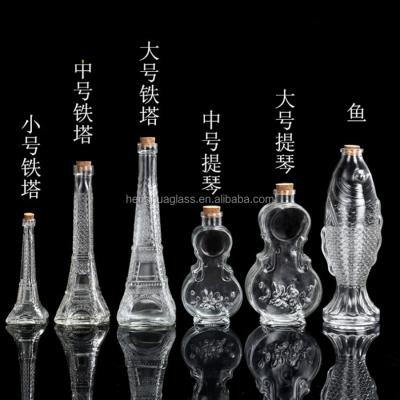 China Wholesale Custom Glass Wish Bottle Shape Eiffel Tower Wedding Gift Glass Wishing Bottle With Cork for sale