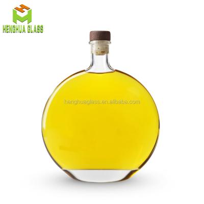 China 500ml Clear Olive Oil Flint Glass Olive Oil Bottle 50cl Round Shape Olive Oil Glass Bottle With Cork for sale