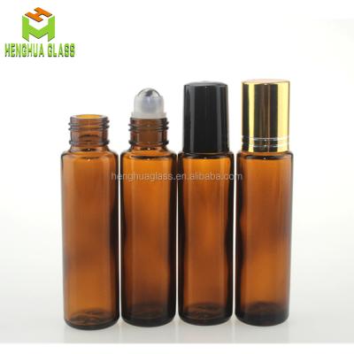 China Personal care in 10ml 15ml essential oil rollon stock amber glass bottle with steel roll on cap for cosmetic packaging for sale