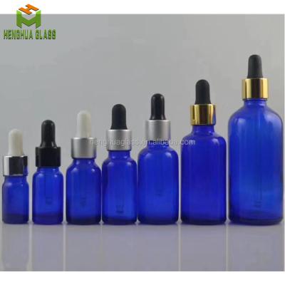 China Wholesale 5ml 10ml 15ml 20ml 30ml 50ml 100ml Essential Oil Glass Bottles Blue Essential Oil Dropper E Liquid Bottles for sale