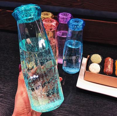 China Water In Stock 500ml 16oz Colored Diamonds Shaped Mineral Water Glass Cup Bottle for sale