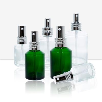 China 2021 Latest Cosmetics Green Glass Cosmetic Bottles 50ml Spray Glass Bottle for sale