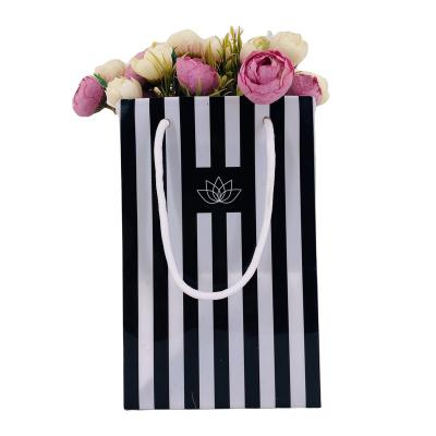 China New moisture proof plastic flower bags, plastic bag for flower with paper backing for sale