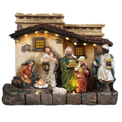 China Holy Warm Seasonal Religious LED Home Decor Musical LED Light Up Collectible Nativity Scene Resin Figurines For Christmas Decor for sale