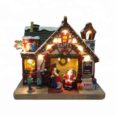 China Christmas holiday decor & Polyresin musical house toyshop gift Christmas Santa creative led model decoration of village musical house with Christmas scene for sale