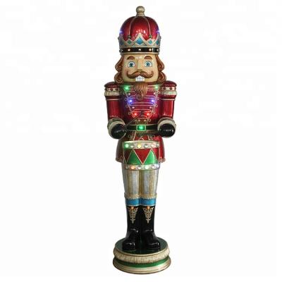 China Christmas Home Decor Christmas Outdoor Decor Wholesale Animated Life Size Animated Nutcracker King Christmas Nutcracker With Music And Led Light for sale