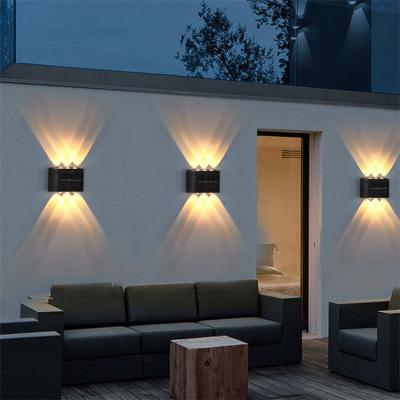 China Waterproff Through Solar Outdoor Wall Light Home Yard Garden Decoration Waterproof Luminous Wall Light Outdoor for sale