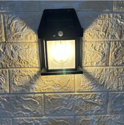 China New Waterproof 2023 Outdoor Motion Sensor Tungsten Filament Bulb Solar Power Wall Light For Patio Front Entry for sale