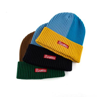 China COMMON Bulk OEM Knitted Winter Unisex Casual Floppy Hats Personalized Color Block Two Tone Beanie for sale