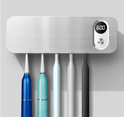 China UV Light Eliminate 99.9% Germs Electric Toothbrush Sanitizer Holder Sterilization Function Toothbrush Holder for Bathroom Air Drying UV-C Sanitizer for Bath for sale