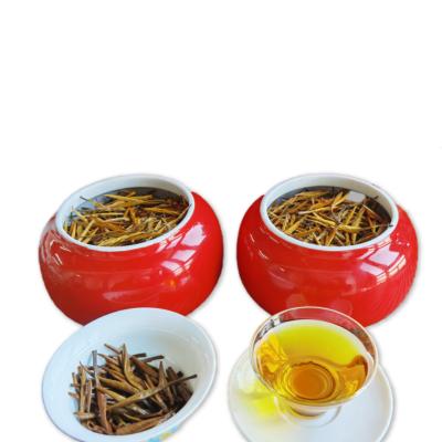 China 2019 Popular Hot Selling Yunnan Gold Needle Raw Materials Red Puer Cake Rich And Oily Shaped Tea for sale