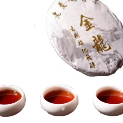 China The taste was full and thick China traditional professional made Yunnan Dragon Pu'er golden cake tea 2009 for sale