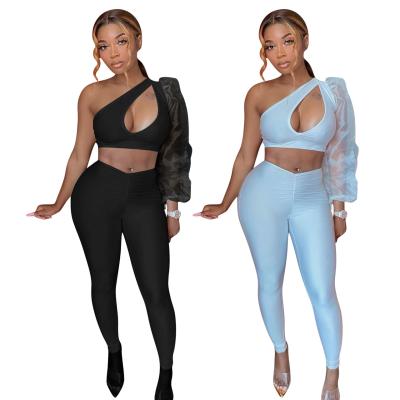 China 2021 New Arrivals QUICK DRY Fashion Sets Fashionable Women Clothes Crop Top Pants Two Piece Set for sale