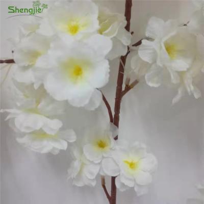 China Indoor Decoration Mini White Artificial Cherry Blossom Branches For Celebration for sale