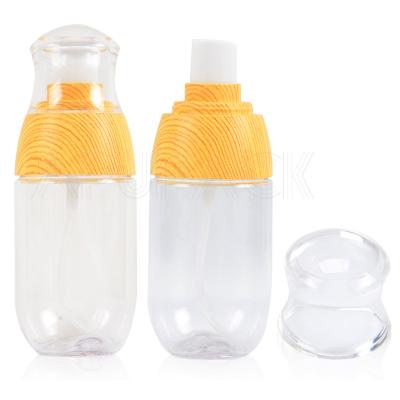 China Clear Round Lid UPG PETG 50ml 120ml 80ml Cosmetic Eco-friendly Plastic Clear Bottle Wooden Body Mist Bottles ACP Bottle for sale