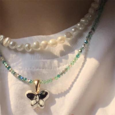 China 2022 TRENDY Women Vintage Jewelry Crystal Necklace Butterfly Pendant Simple Color New for sale