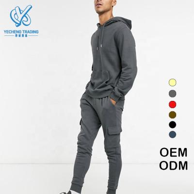 China Manufacturer Custom Men Jogging Breathable Professional Tracksuit Set Pullover Hoodie Cargo Sweatpants Tracksuits Set for sale