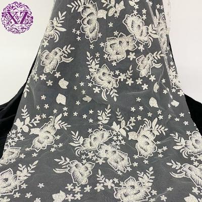 China Sustainable Wholesale Dubai Garment Beautiful Durable Mesh Polyester Chunky Lace Fabric For Fashion Wear for sale